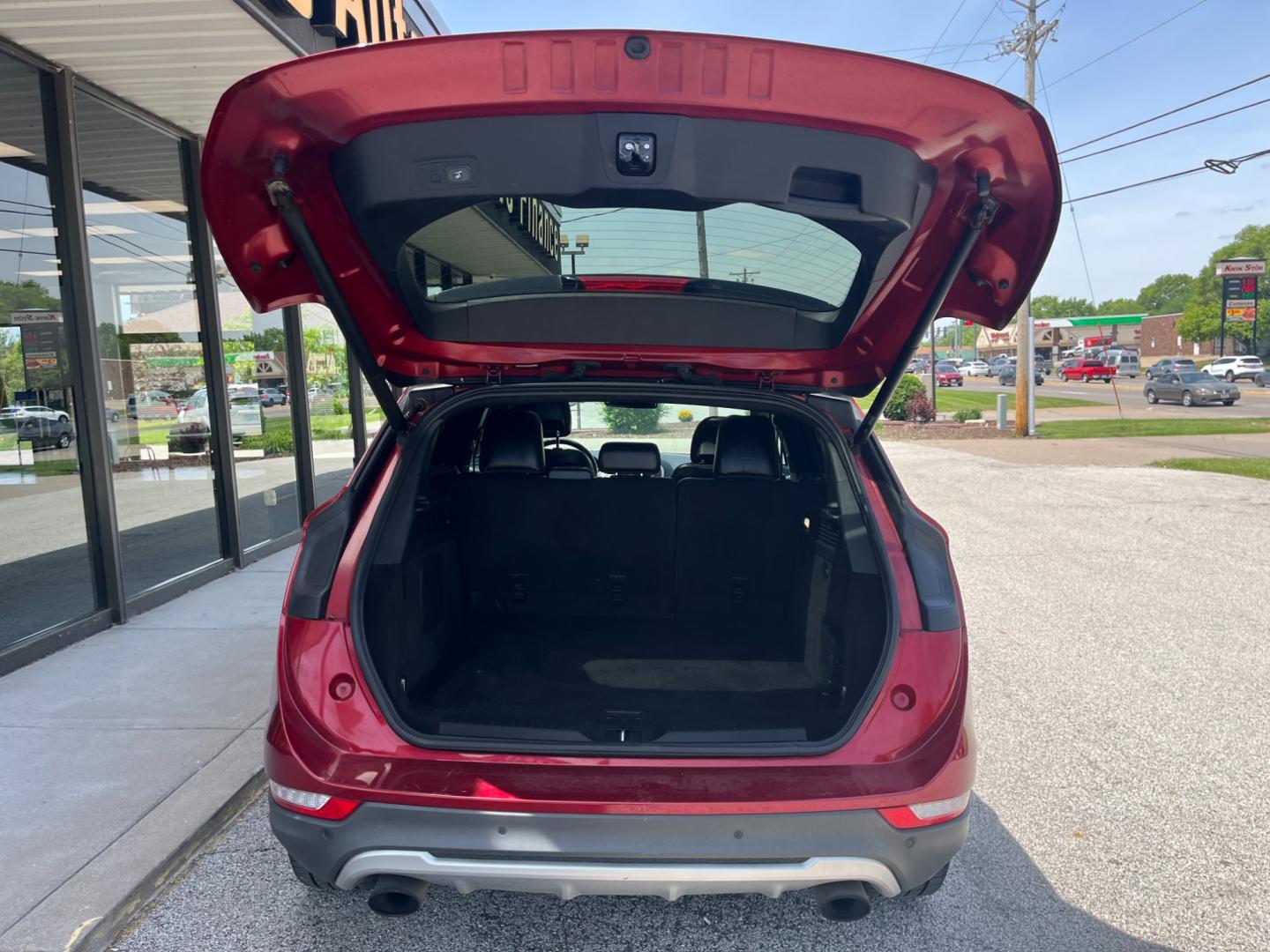 2015 Ruby Red Met Tinted CC Lincoln MKC AWD (5LMCJ2A92FU) with an 2.0L L4 DOHC 16V engine, 6-Speed Automatic transmission, located at 1633 W Kimberly, Davenport, IA, 52806, (563) 323-5341, 41.559456, -90.598732 - Photo#5